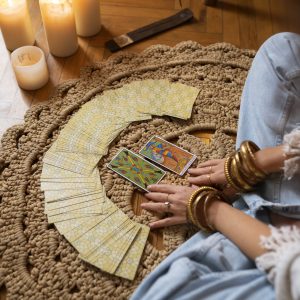 high-angle-woman-reading-tarot-home-9-scaled.jpg