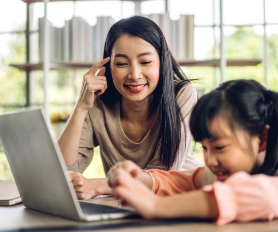 mother-asian-kid-little-girl-learning-looking-laptop-computer-making-homework-studying-knowledge-with-online-education-e-learning-system-children-video-conference-with-teacher-tutor-home-scaled.jpg